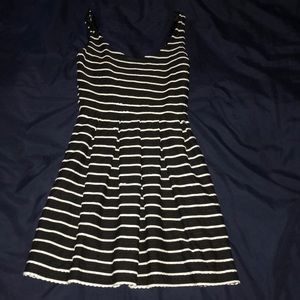 Form fitting black and white striped flair dress